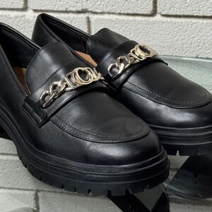 Chic Black Leather Loafers with Silver Chain Detail